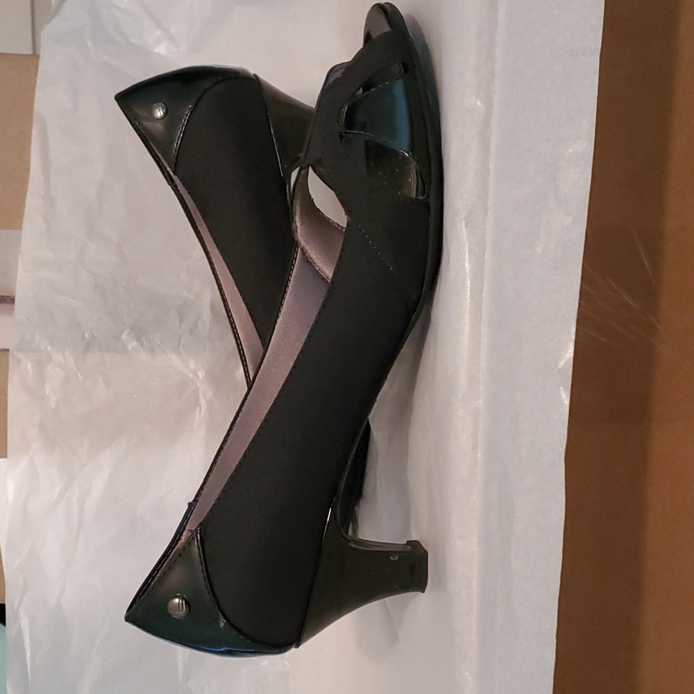 Size 10 black heels.   Open toe.  Life Stride.